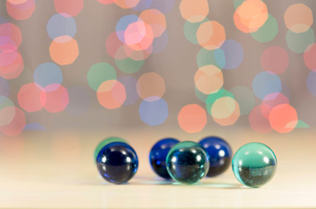 Glass balls on the background bokeh. Texture of colorful balloons.の写真素材