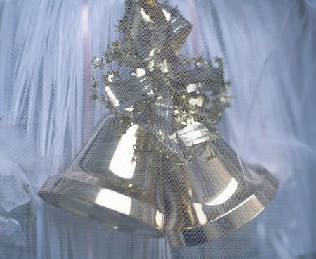 Two bells behind the curtain. Two Christmas bell.の写真素材