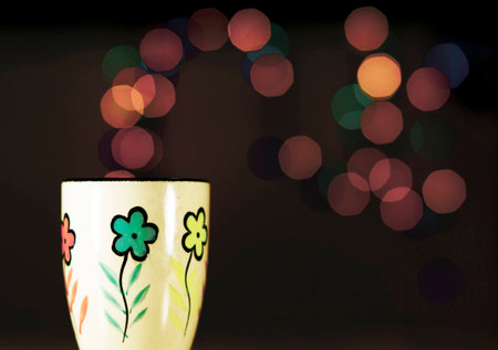 Tea mug on the background bokeh. Ceramic mug stands on the table.の写真素材