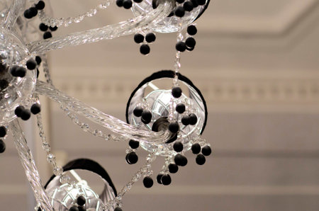 Brass chandelier with crystal. Lighted chandelier with crystal pendants.の写真素材