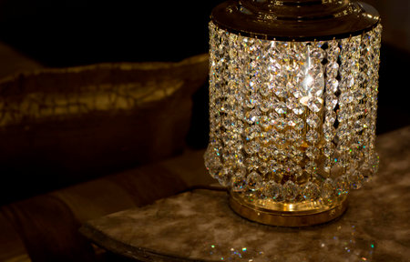 Brass sconces with crystal. Lighted sconces with crystal pendants.