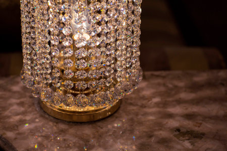 Brass sconces with crystal. Lighted sconces with crystal pendants.の写真素材
