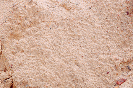 sand texture background. beach sand background. sand texture on the beach. Brown sand texture. Sand background for design with copy space for text or image.  Sand background.の写真素材