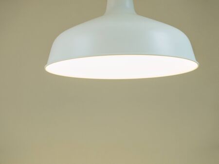 The lamp on the grey wall. Close upの写真素材