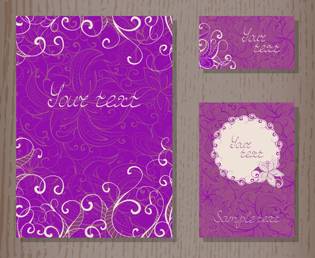 set of templates invitations or greeting cards with decorative floral elements on a wooden backgroundのイラスト素材