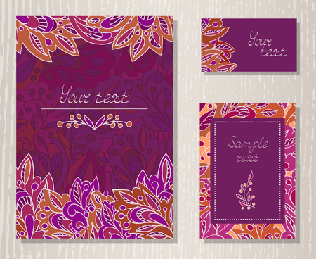 Vector set of templates invitations or greeting cards with decorative floral elements on a wooden background. Collection of templates in purple and orange colors.のイラスト素材