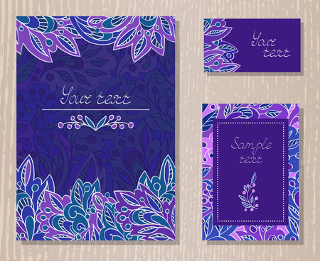 Vector set of templates invitations or greeting cards with decorative floral elements on a wooden background. Collection of templates in purple and blue colors.のイラスト素材