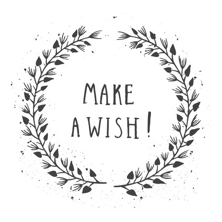 Vector hand drawn illustration of text MAKE A WISH! And floral round frame with grunge ink texture on white background. Monochrome.のイラスト素材