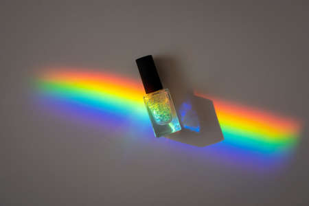 Holographic Nailpolish in a prism rainbow lineの写真素材