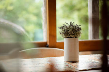 Dry flowers in a vase in a holiday house. Summer cottage vacationの写真素材