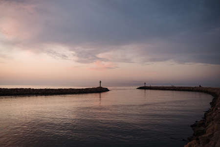 Pier at dawn in Valras France Pink and purle sky, beautiful sea
