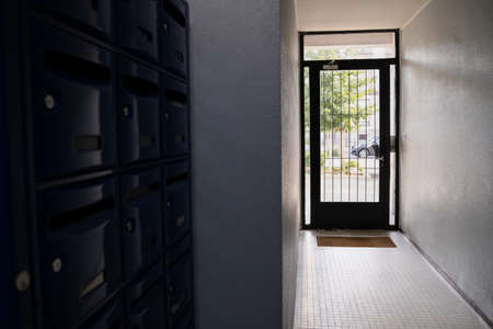 apartment building ground floor corridor in summer. Living togetherの写真素材