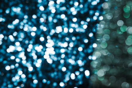 blue and green bokeh background for christmas and new year holiday beauty products marketingの写真素材