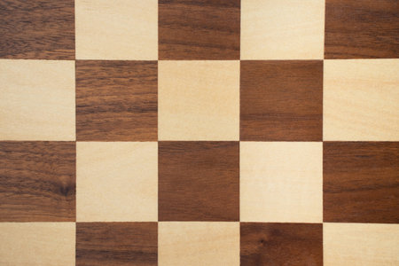 Wooden darl and light chess board backgroundの写真素材