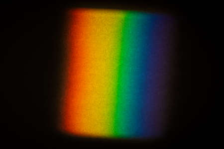 A Prism Full Rainbow Light on paper Background Overlay