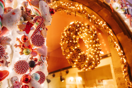 STRASBOURG, FRANCE - December 2021 - Magical Christmas decorations on historic bakery in historic city centreのeditorial素材