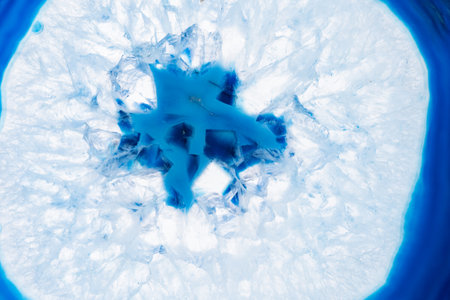 Amazing blue agate cut cross section. Natural crystal mineral formation. Beautiful texture macro...