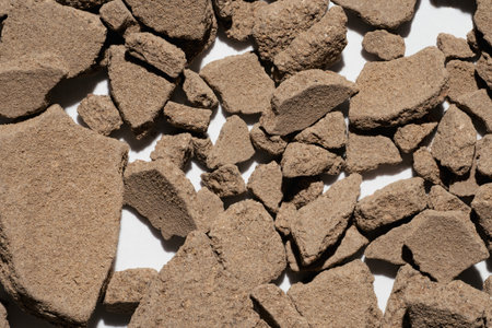 Raw cosmetic brown clay. Natural skincare and hair care. textured backgroundの写真素材