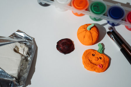 Paint and clay pumpkin and witch hat for Halloween arts and crafts
