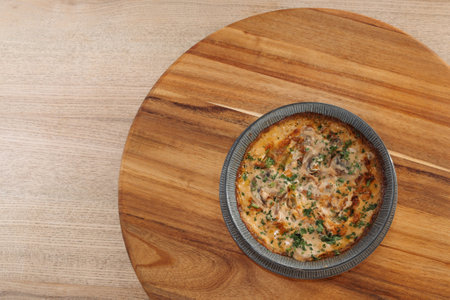 baked mushroom dish. Delicious freshly prepared meal, perfect for menus, restaurants, or food...