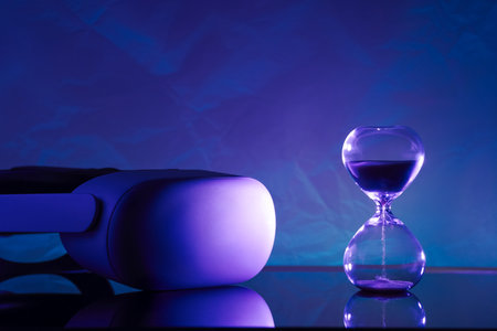 Creative composition featuring a glowing VR headset paired with an hourglass, symbolizing technology...