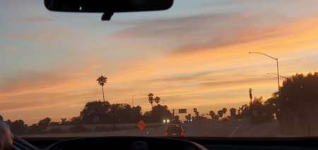 Los angeles highway at sunset view from car. Mobile photography, real phone snapshot