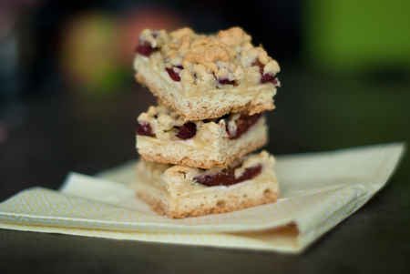 a few pastries stuffed with plums on the tableの写真素材