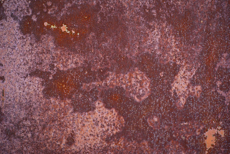 Old metal surface with rust spots