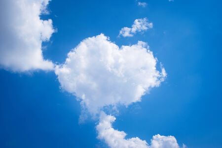 White heart from the cloud in the skyの写真素材