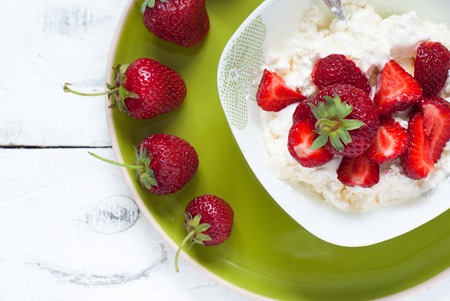 Curd with yogurt and strawberries - delicious and healthy breakfast.の写真素材