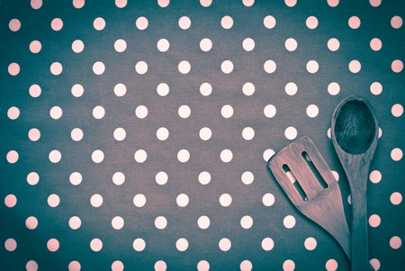 Cotton tablecloth and wooden kitchen utensils. Vintage style.の写真素材