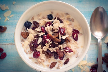 Healthy Breakfast - Oatmeal with dried fruit.の写真素材