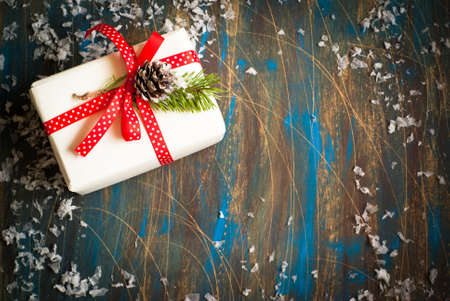 Christmas present with decorations. Top view, copy space.の写真素材