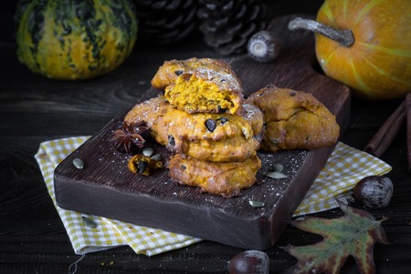 Pumpkin cookies with chocolate drops. Close-up, selective focus.の写真素材
