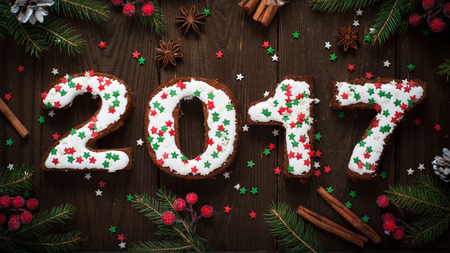 Festive New Year baking. sweet pastry letters 2017 and decorations. Christmas dessert food.