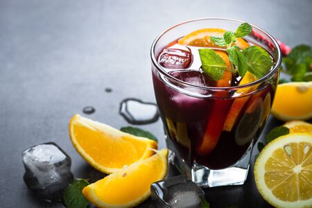 Sangria with fruit mint and ice. Traditional alcoholic cocktail. Summer drink.の写真素材