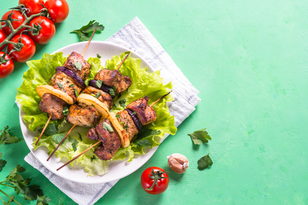 Grilled shish kebab or shashlik on green table.の写真素材