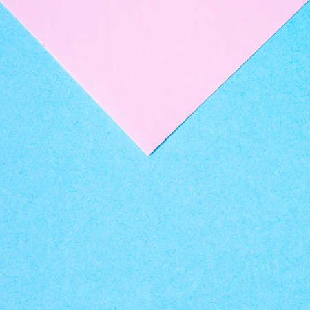 Blue and pink paper background.の写真素材