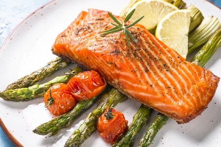 Grilled salmon fish fillet with asparagus.