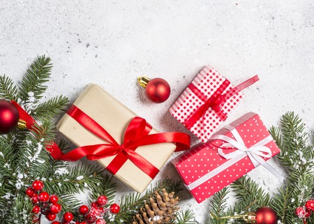 Christmas background with fir tree, candle and decorations on whの写真素材