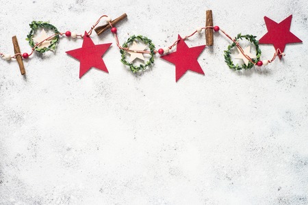 Christmas garland on white top view.の写真素材