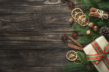 Christmas food background with spices and nuts on dark wooden tableの写真素材