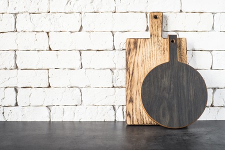 Wooden  cutting boards on the kitchen.