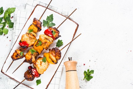 Chicken kebab grilled meat on white.の写真素材