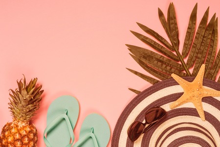 Summer flat lay background on pink.の写真素材