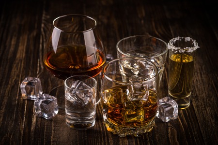 Strong alcohol drinks - whiskey, cognac, vodka, rum, tequila.