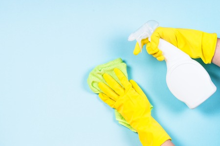 Cleaning concept on blue background.の写真素材