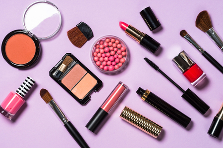 Makeup professional cosmetics on purple background.の写真素材