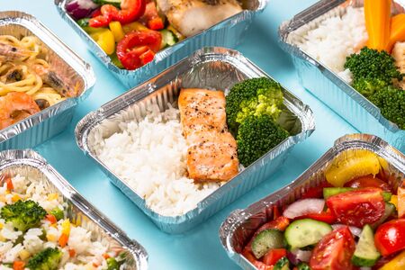 Food delivery concept - healthy lunch in boxes.