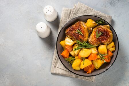 Baked chicken with vegetables top view.の写真素材